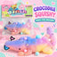 Pastel rainbow glitter crocodile squishy toy with soft squeeze texture and star decorations